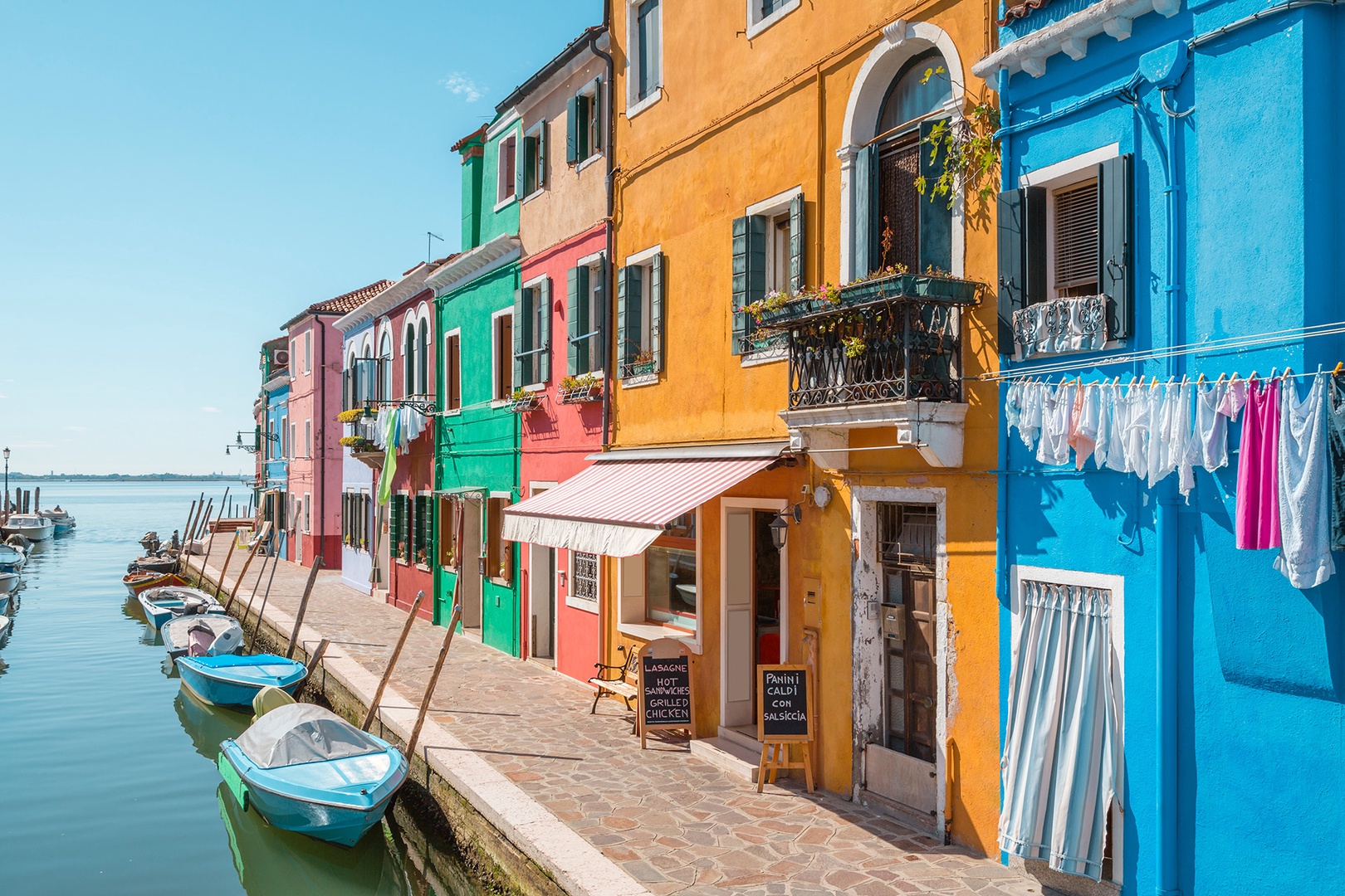 Take day trips to the colorful Burano and Murano islands.