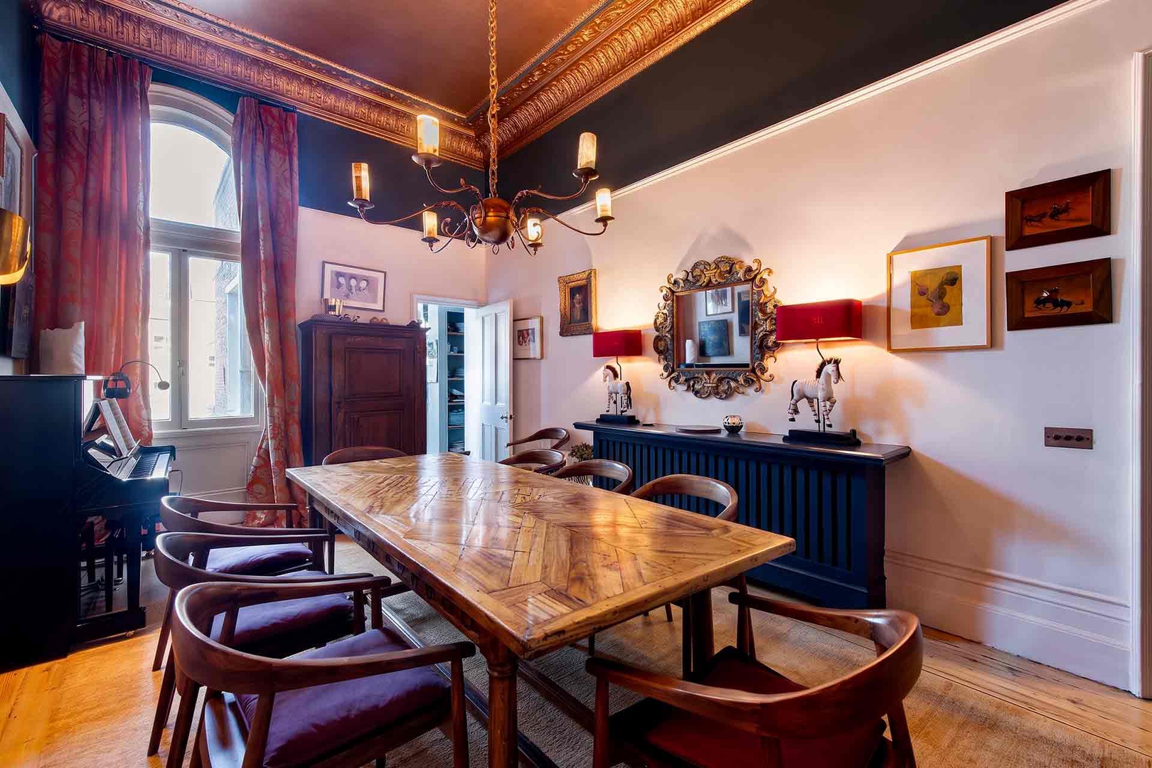 Dining room antique oak table can seat up to 8.
