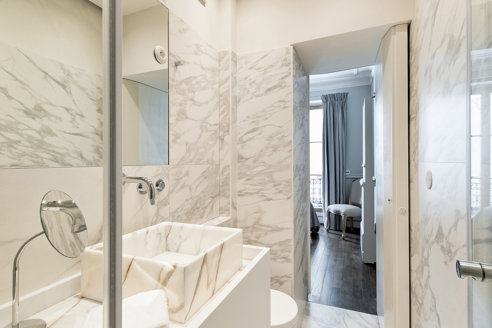 Pamper yourself in the luxurious marble bathroom.