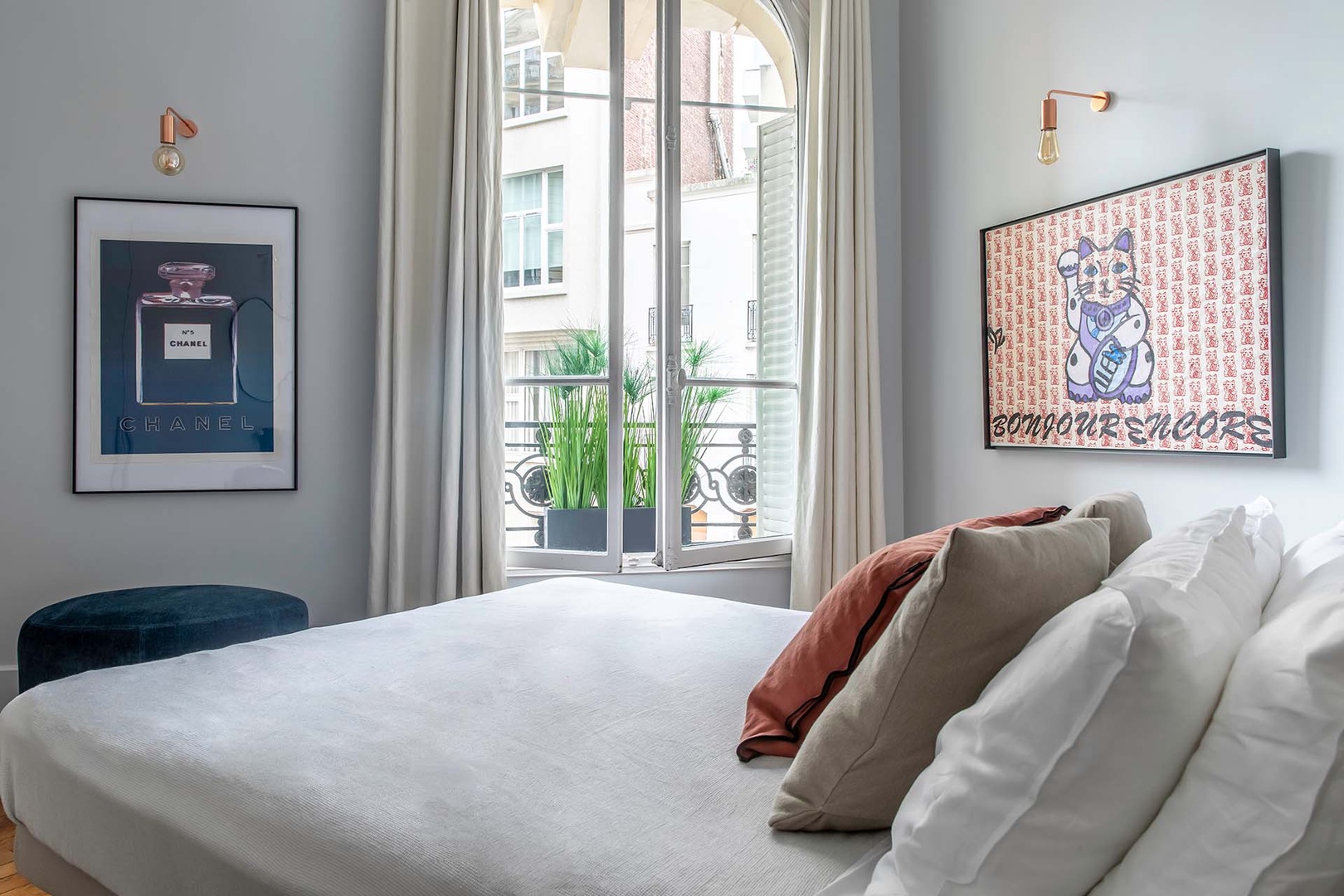 Classic wrought iron window details add a Parisian touch.