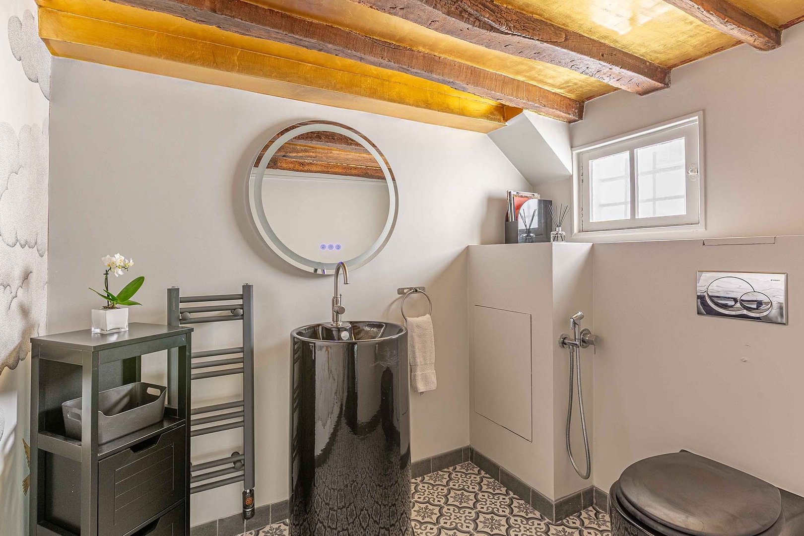 There is a half bath at the end of the hall.