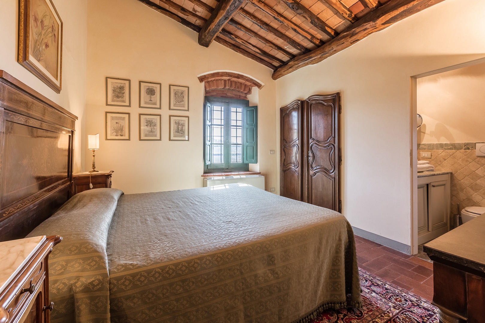 Bedroom 2 has a lovely headboard with a walk in closet and a French Empire bureau.