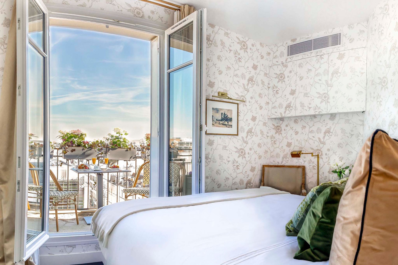 Wake up to views overlooking the rooftops of Paris.