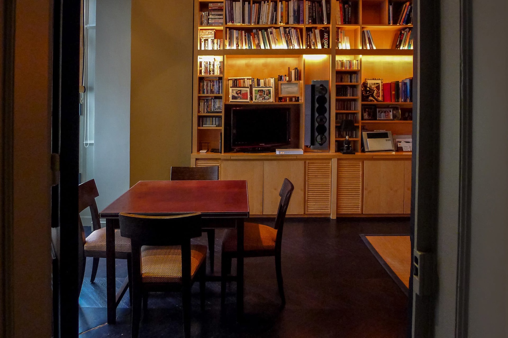 View looking into the den with a game table