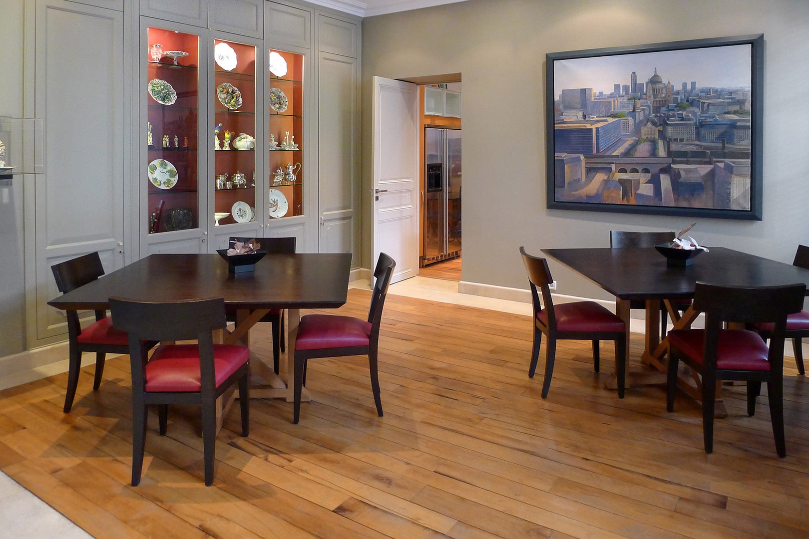 The large dining room with two tables is perfect for entertaining.
