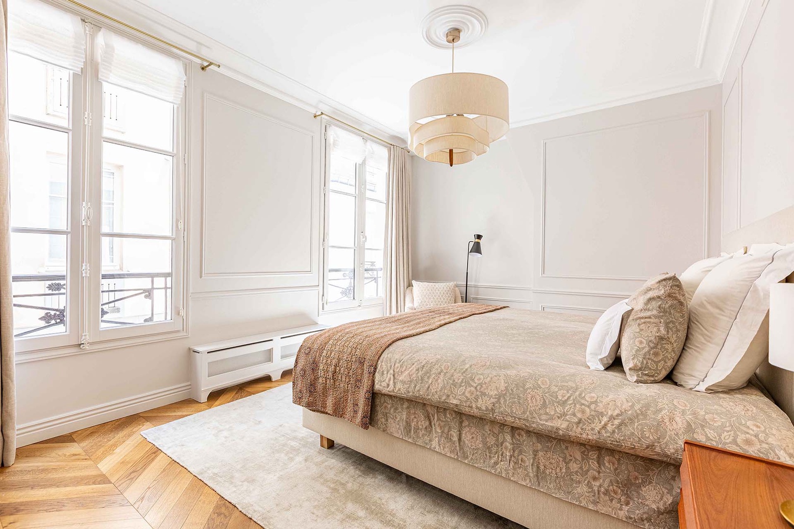 Spacious bedroom 2 overlooks courtyard.