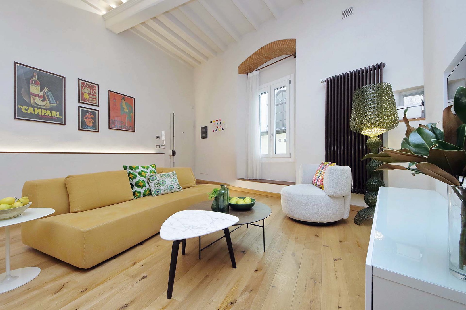 Bright living space with high ceilings.