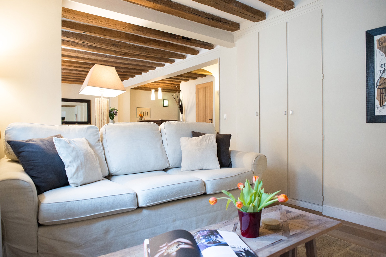 Warm and inviting, the apartment exudes a French countryside vibe.