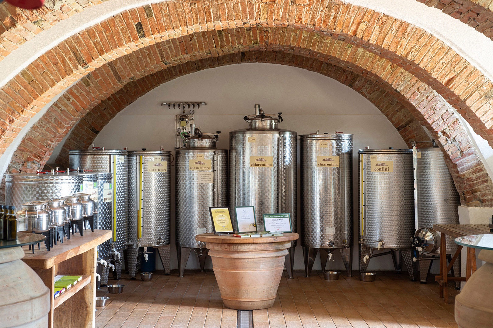 Vats of different olive oils.