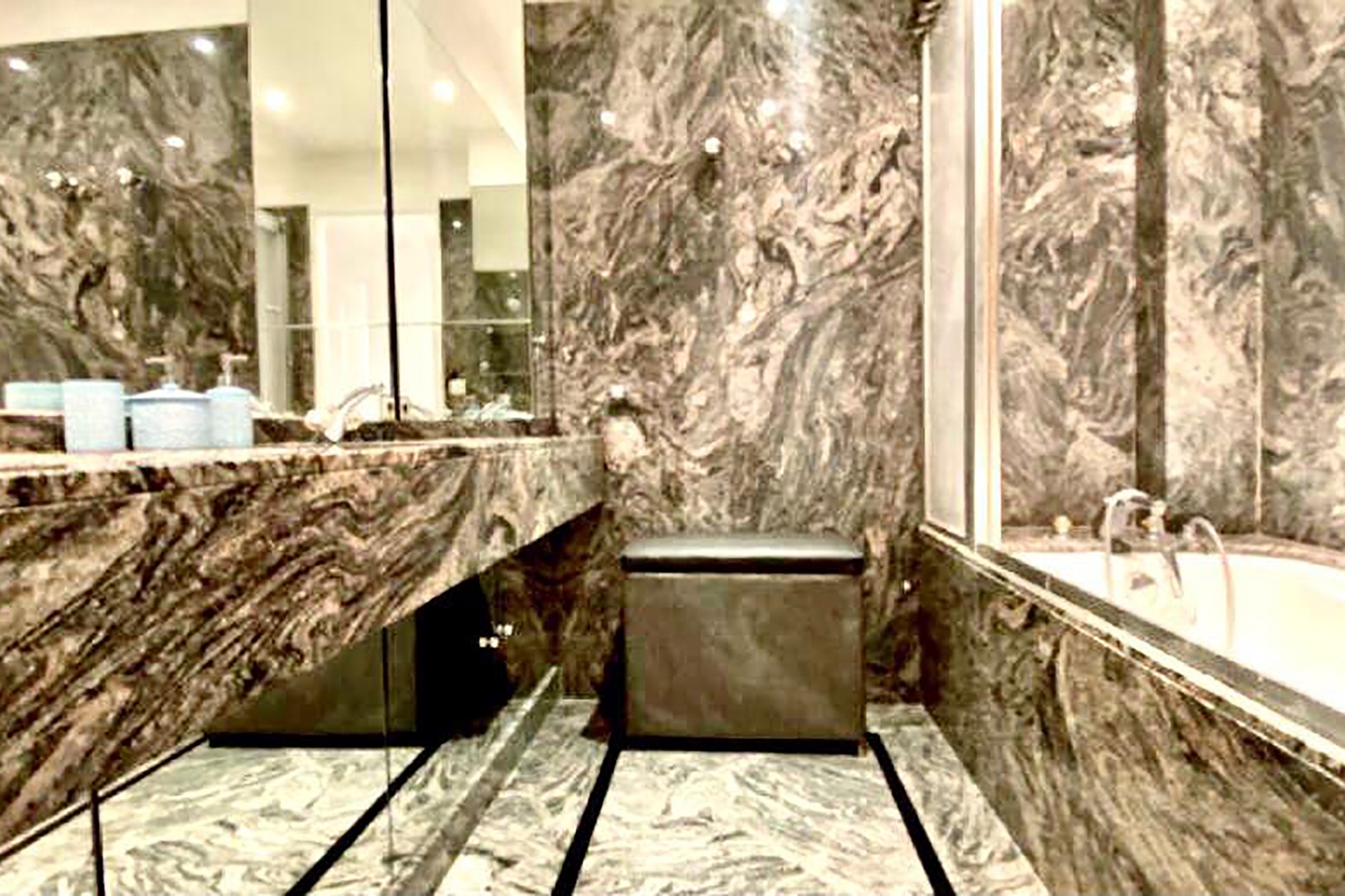 Luxurious and spacious marble bathroom.