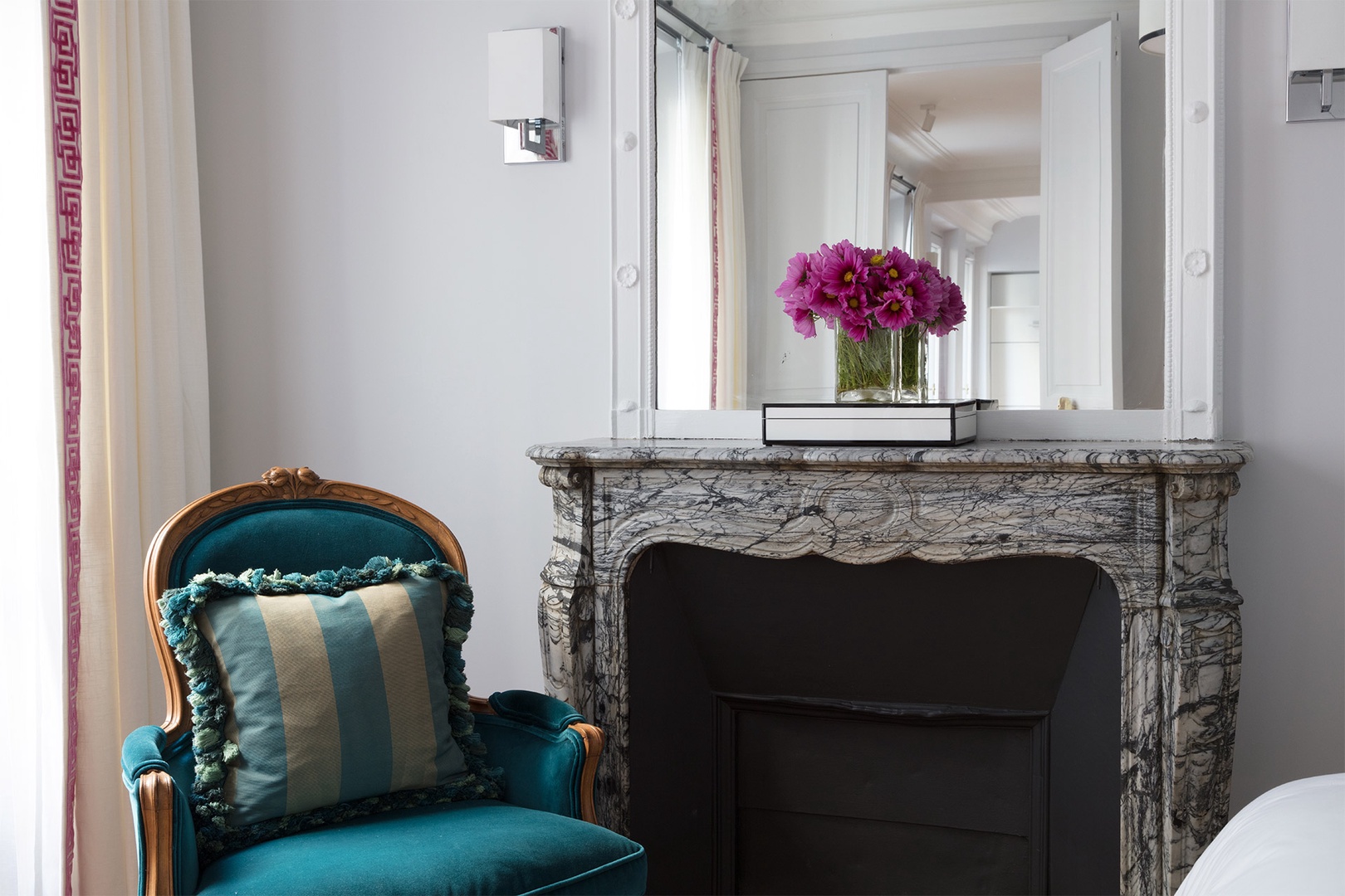 The marble fireplace in bedroom 1 adds lots of charm.