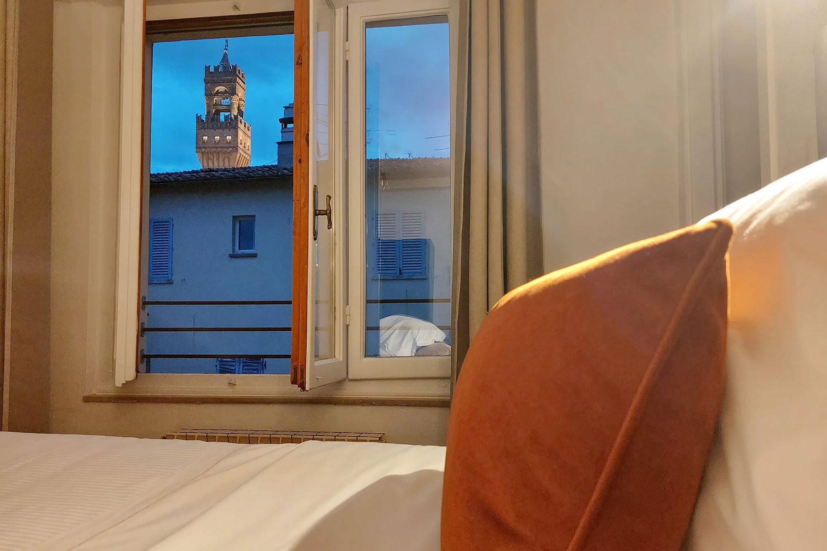 Enjoy views of the bell tower while lying in bed.