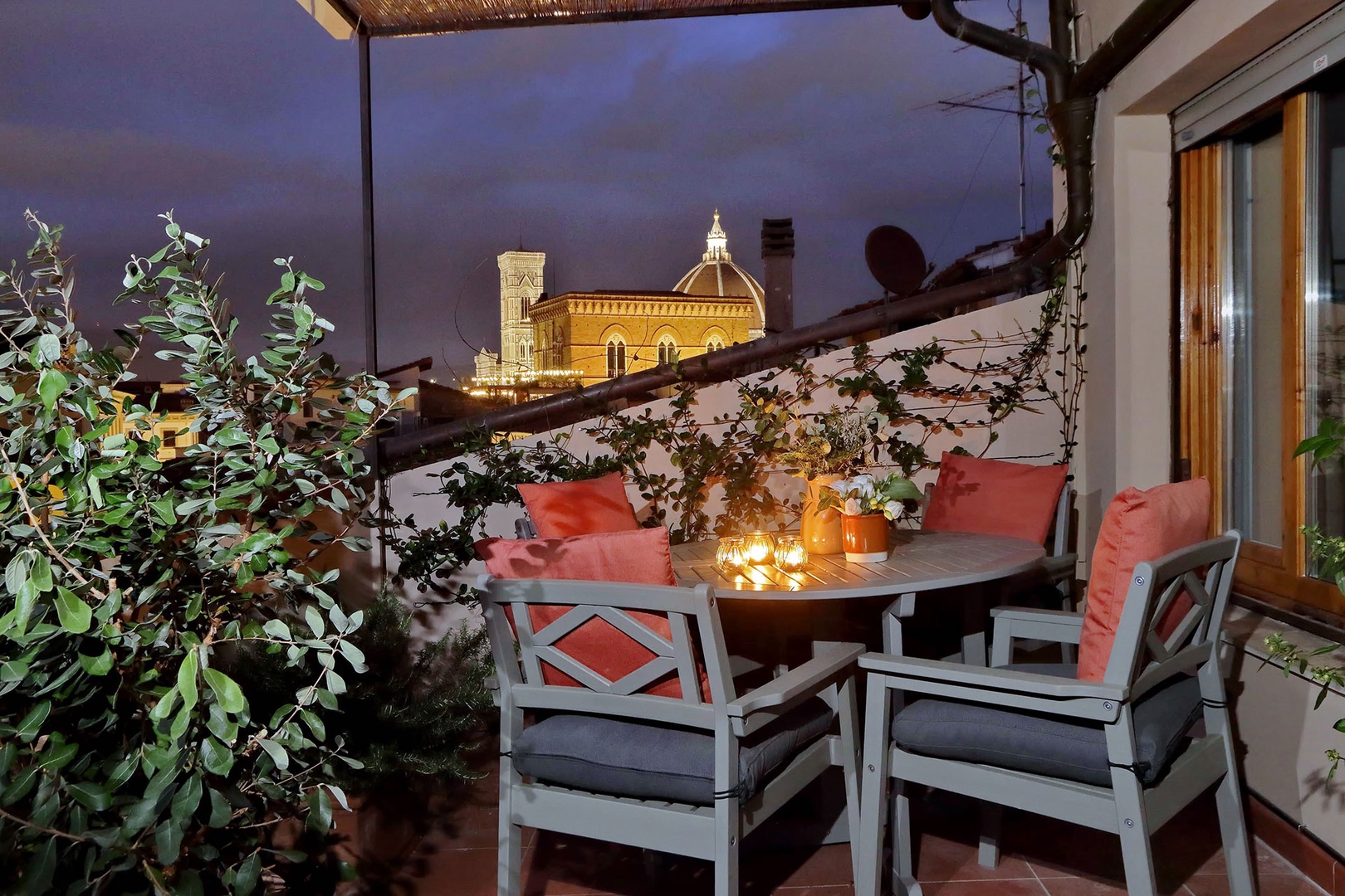 Enjoy views of the top of the Duomo, illuminated at night