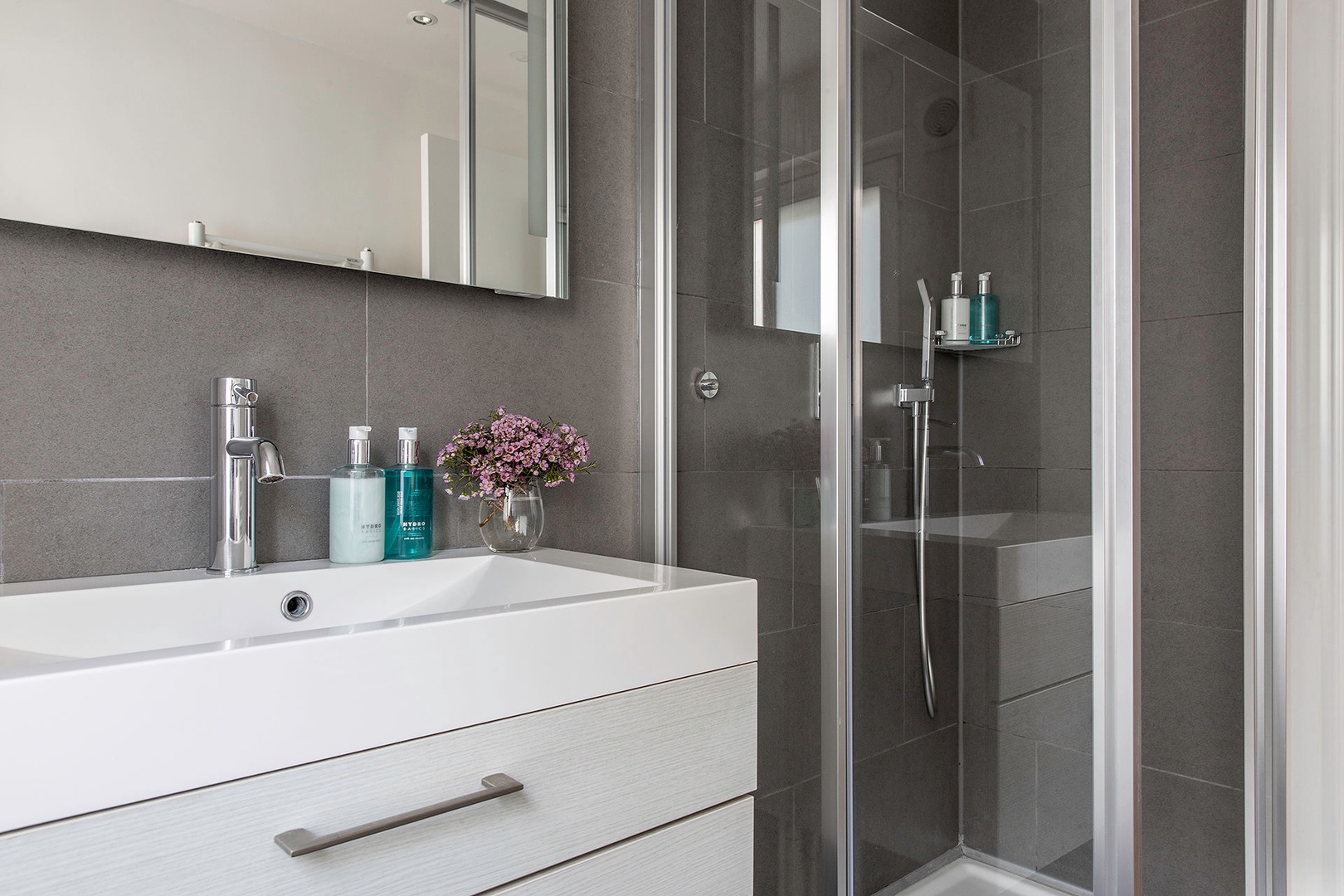 Large shower in the bathroom on the upper level.