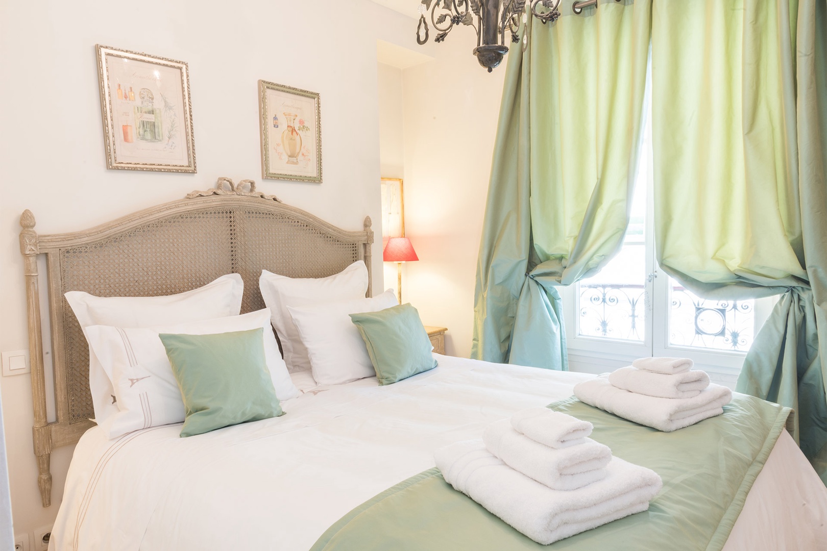 Beautifully decorated bedroom with a large bed.
