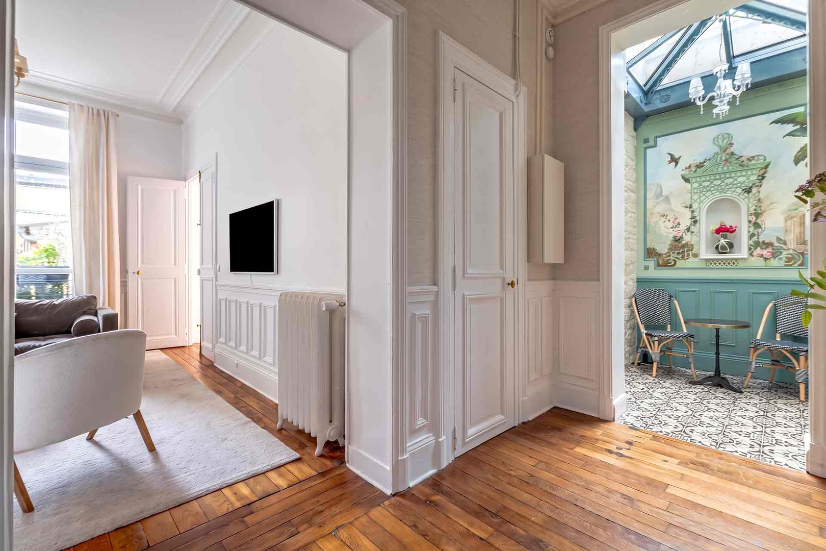 Sunny atrium is located near the living room.