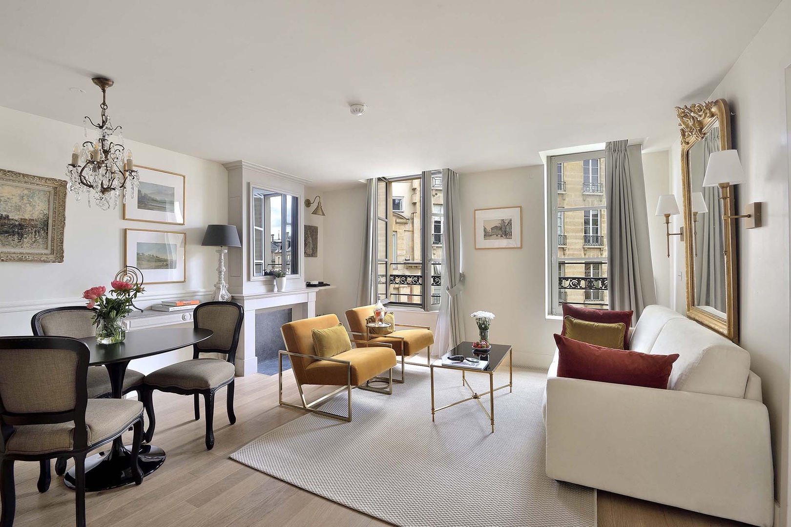 Beautiful large windows overlook charming Place Dauphine!