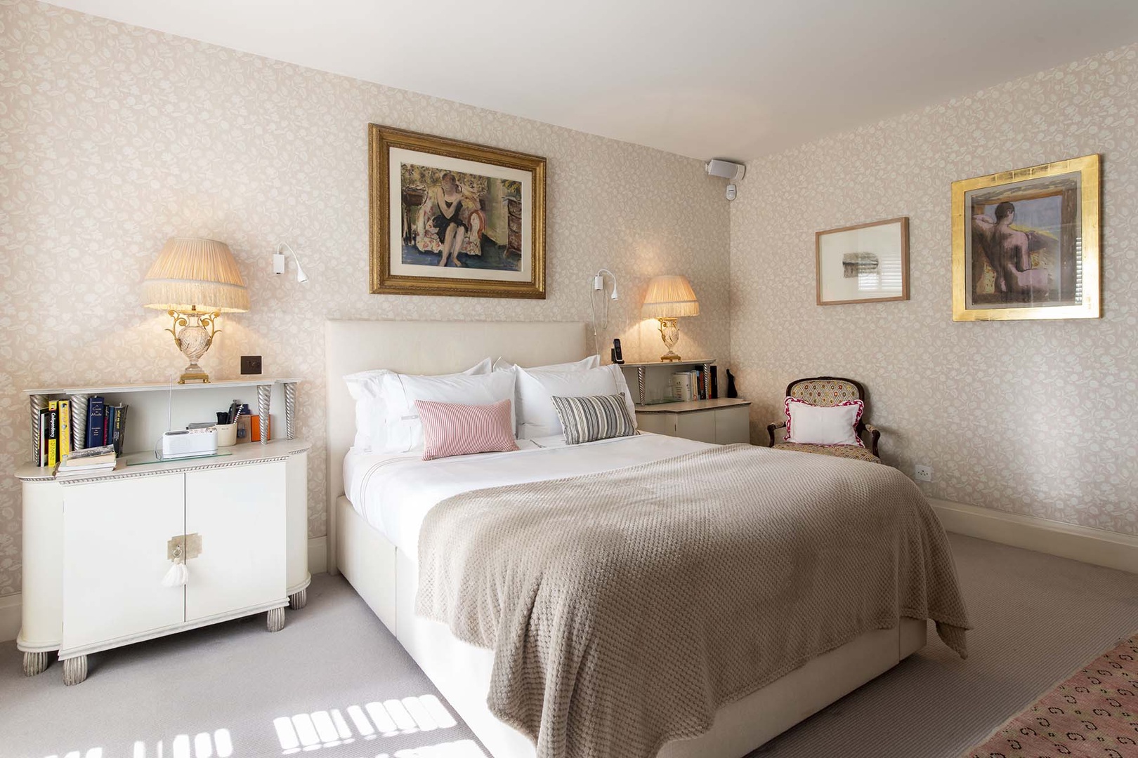 Bedroom 1 is decorated in soft tones.