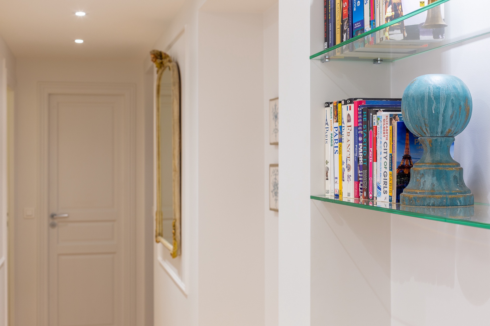 Enjoy the hallway library and use it to plan your Paris stay!