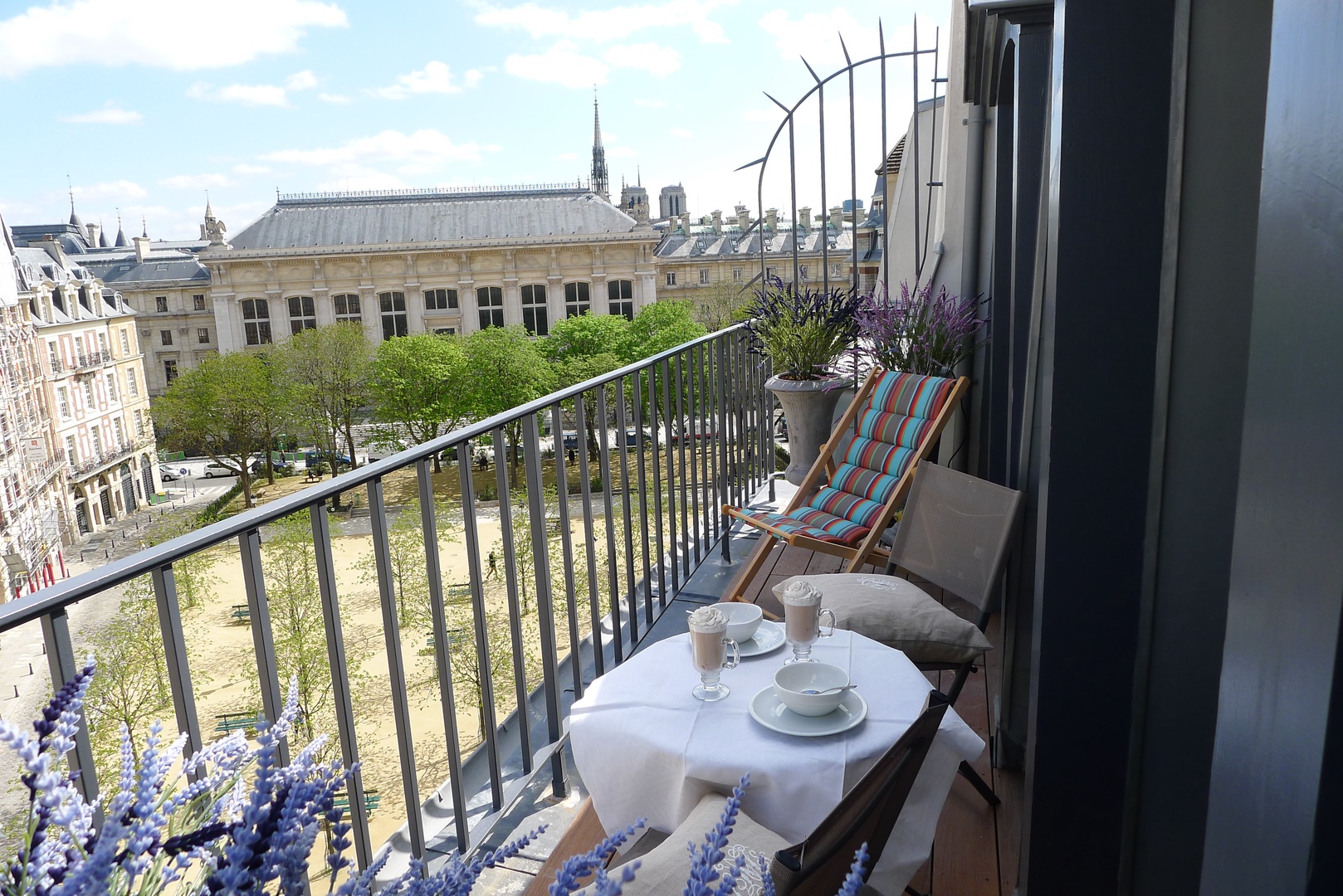 Enjoy your private balcony overlooking the lovely Place Dauphine.