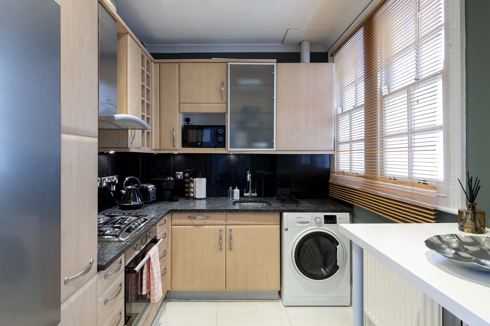 Bright and fully equipped kitchen.