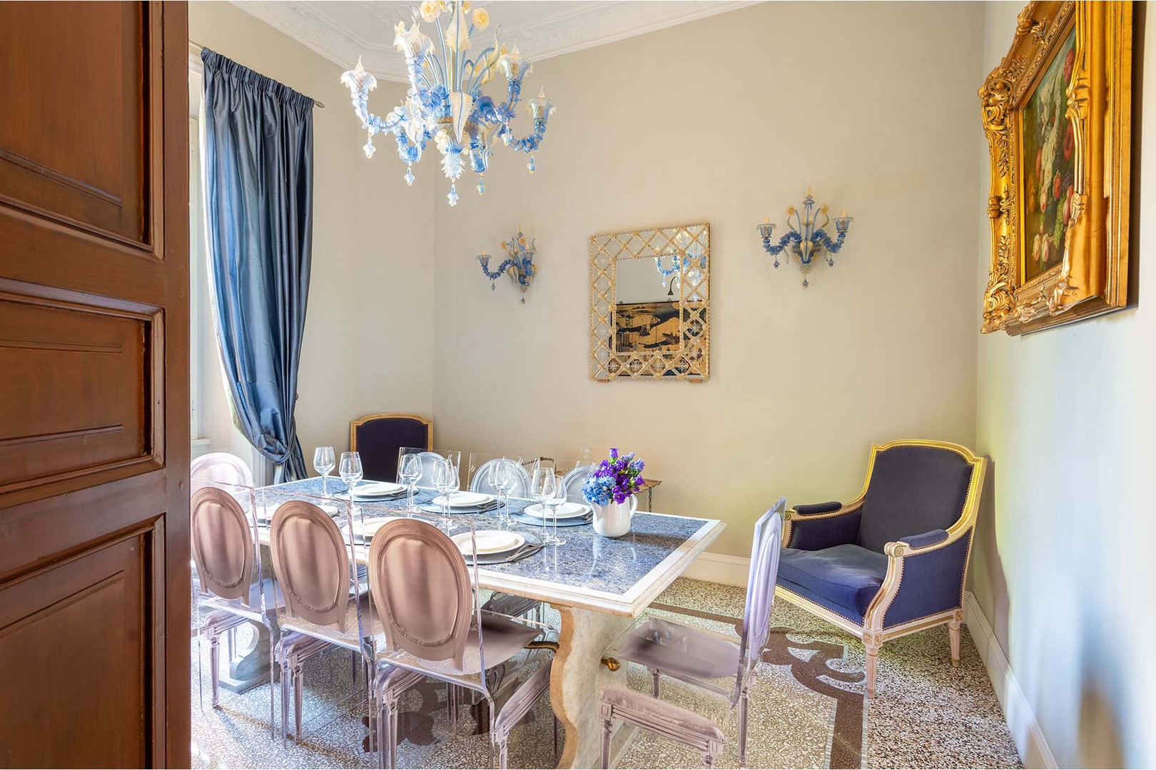 The dining room is stunning in dramatic blues.