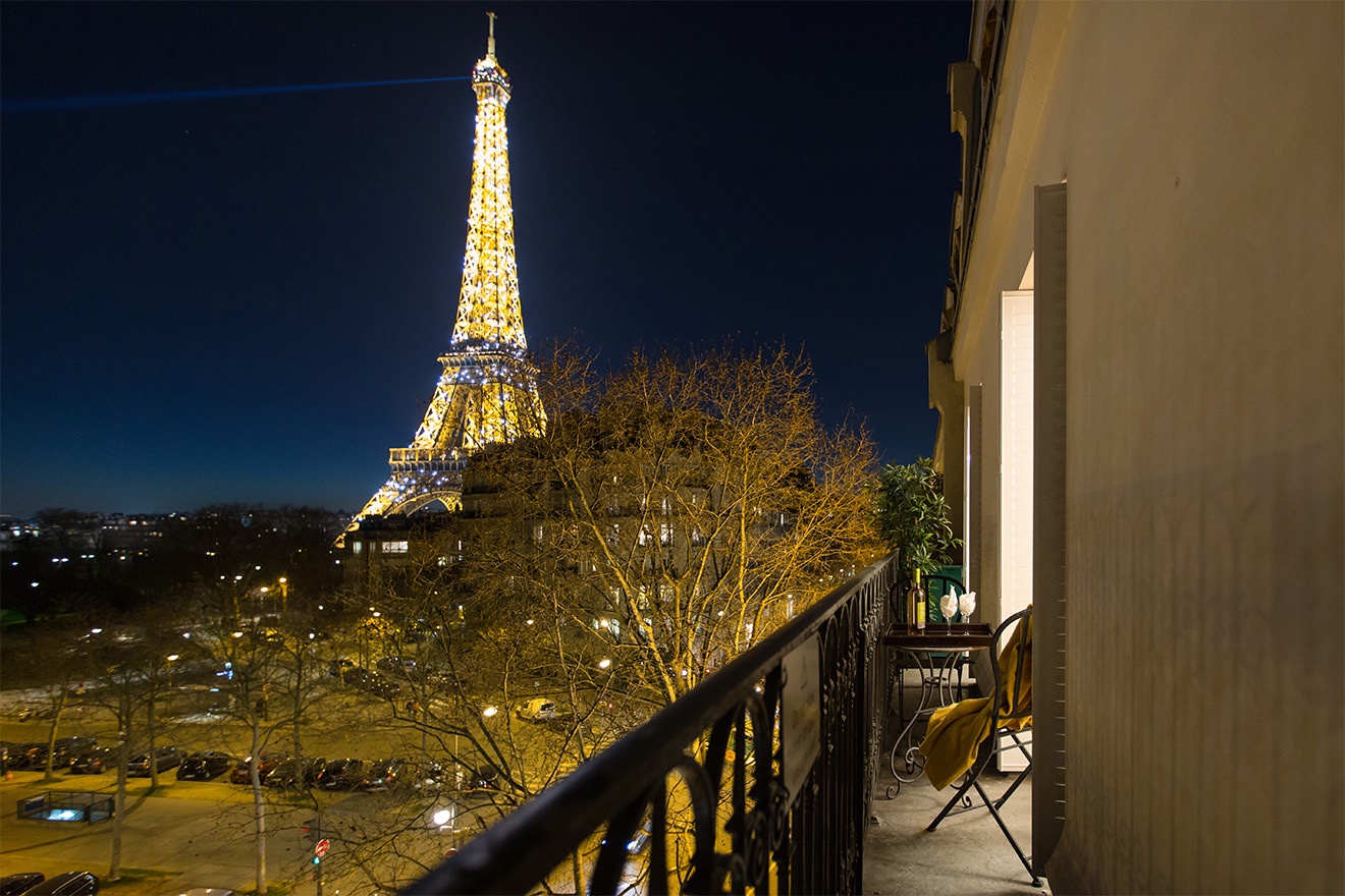 Watch the Eiffel Tower sparkle at night from your balcony!