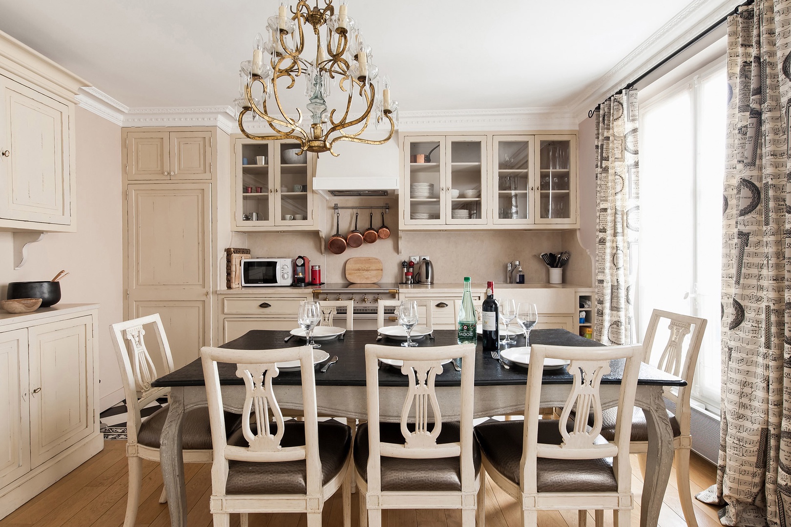 Enjoy beautiful dinners in your Parisian home away from home.