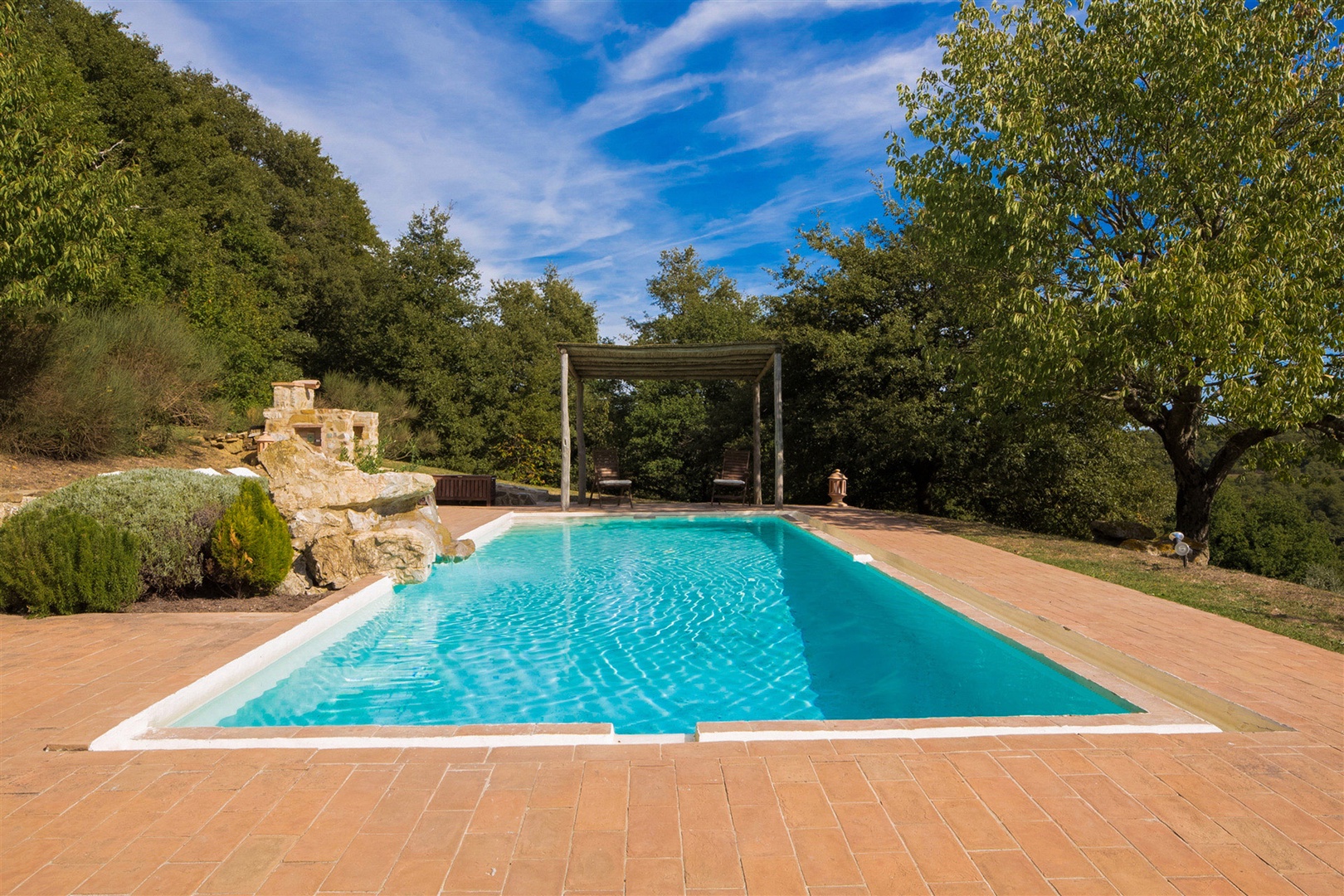 Soak up the Tuscan sun around the large swimming pool.