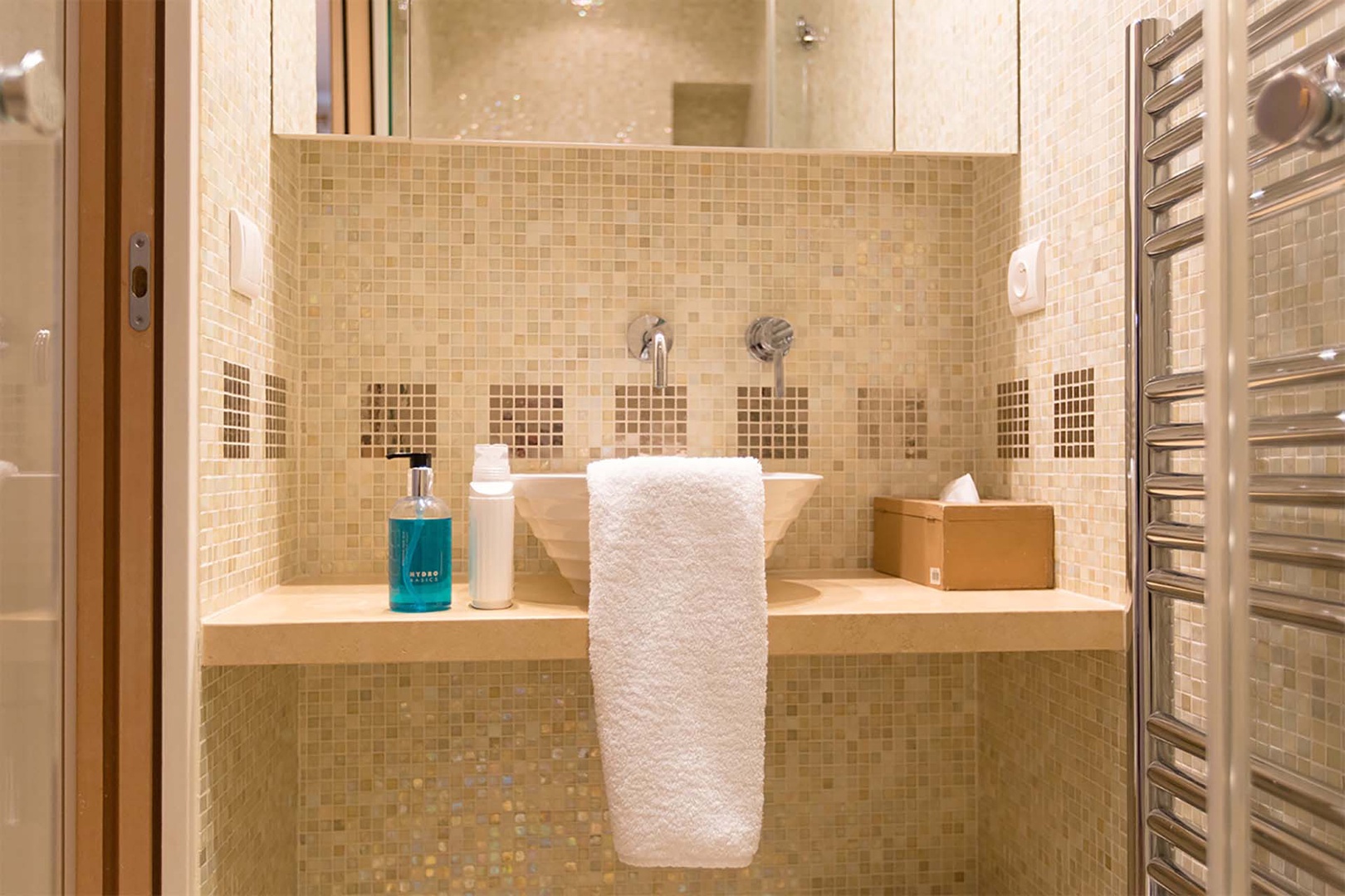 Bathroom 2 features a shower and sink.