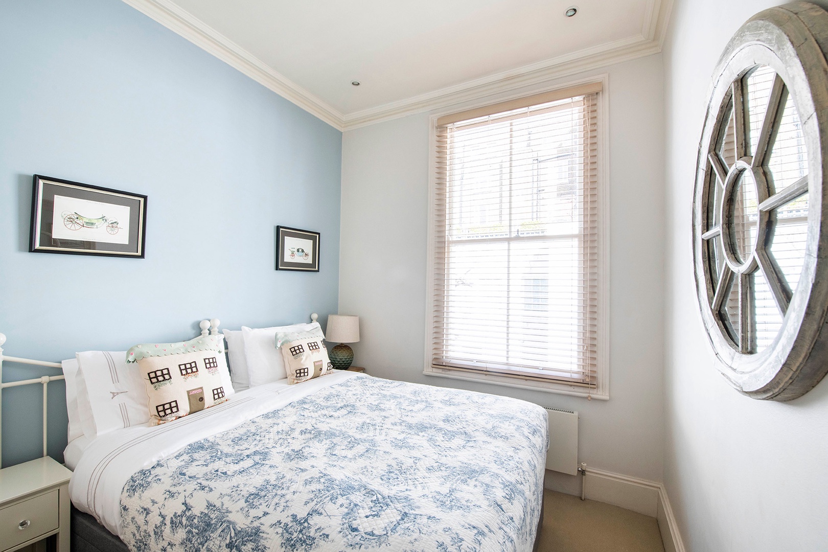 Bedroom 3 with a comfortable bed that can be pushed apart to form two beds and soft shades of blue