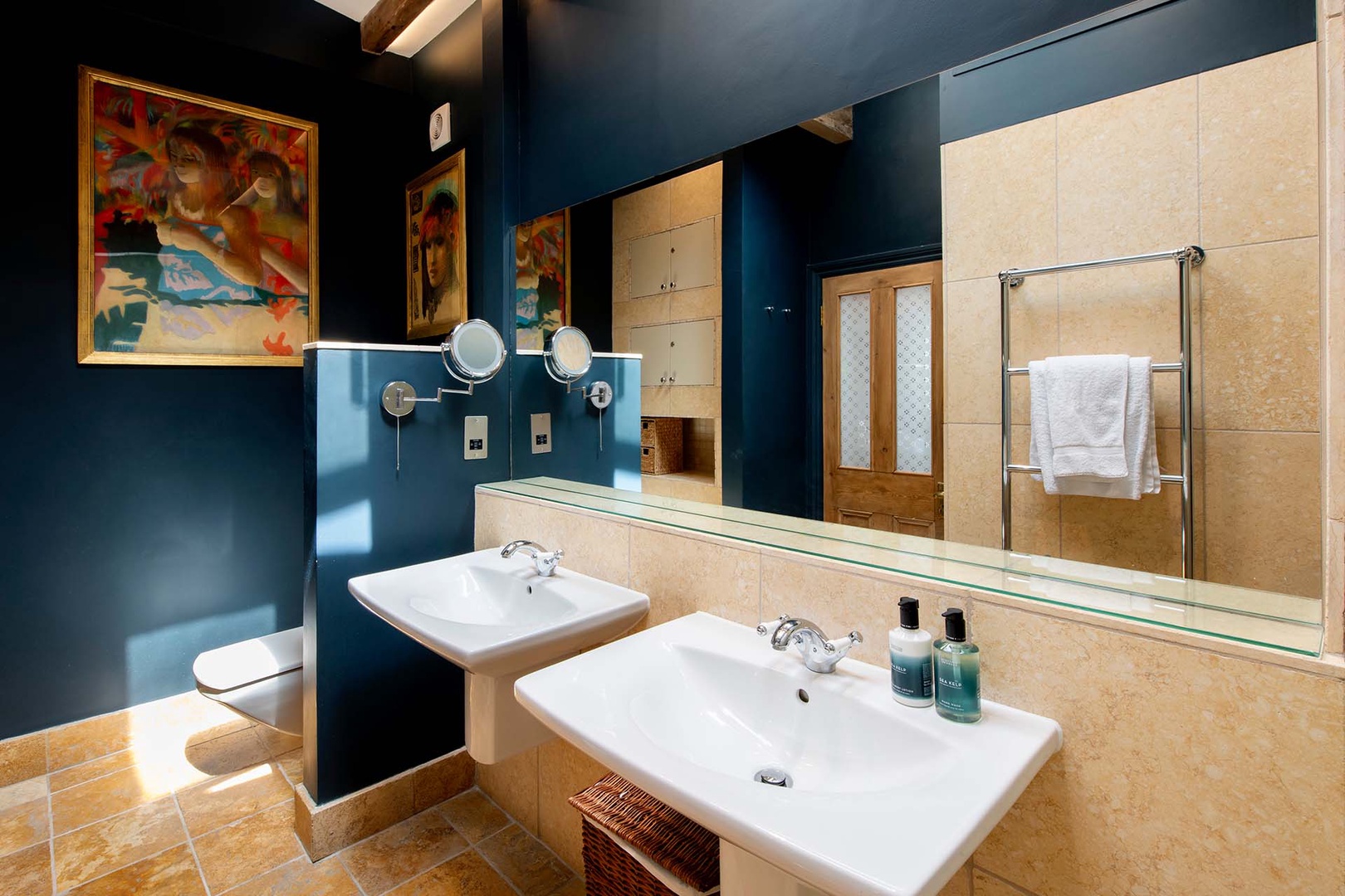 Bathroom 1 with shower, toilet and sink is en suite to bedroom 1.