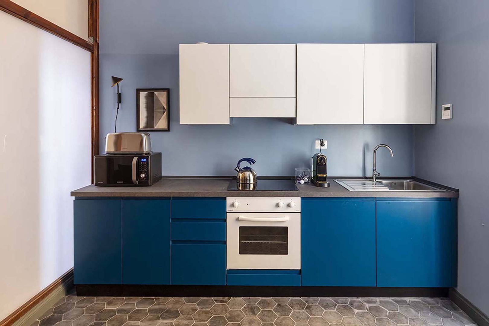 Fully equipped kitchen with plenty of counter space for prepping meals.