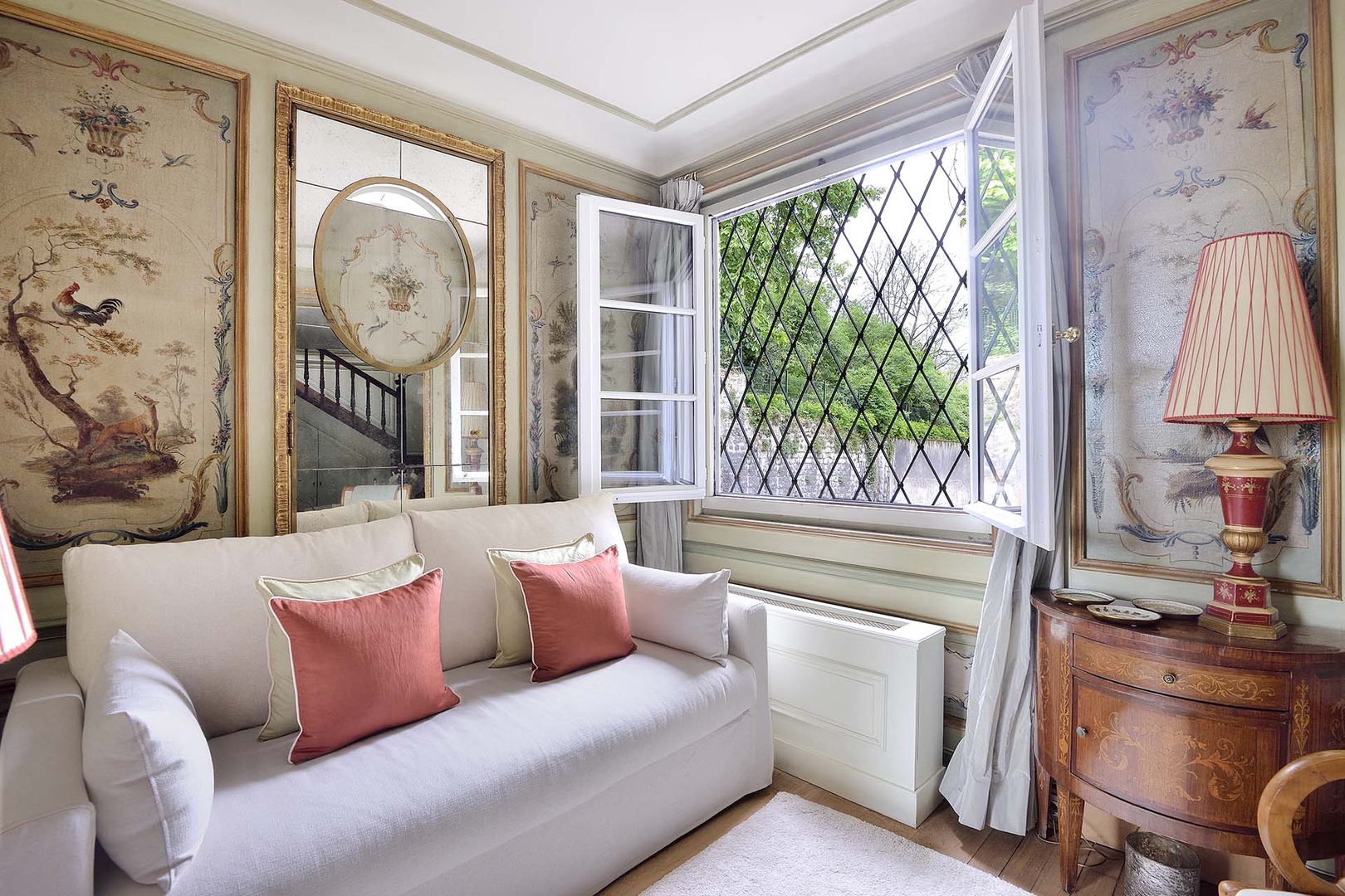 Large window and comfortable sofa.