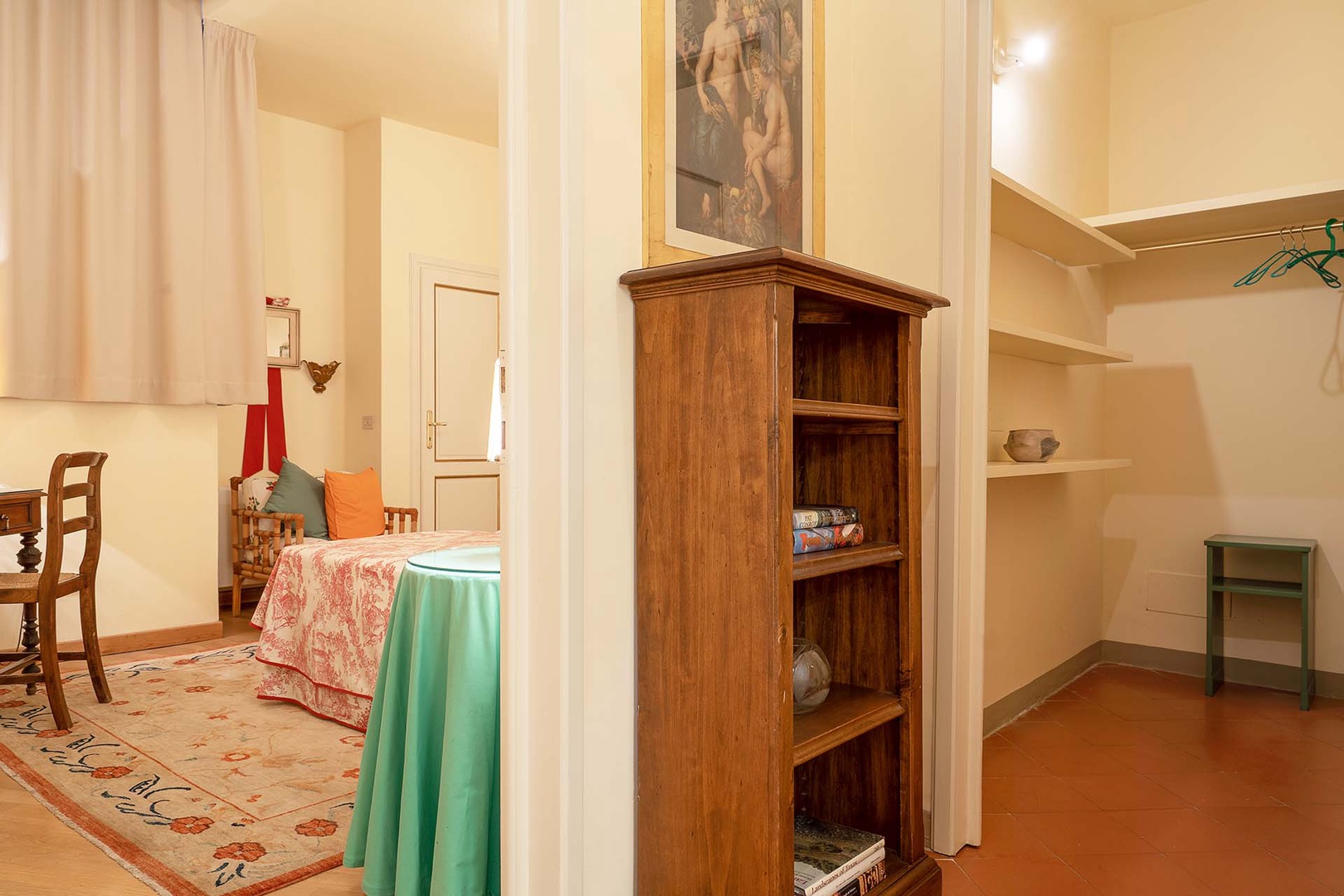 The hallway just outside bedroom 2 leads to the bathroom 2.