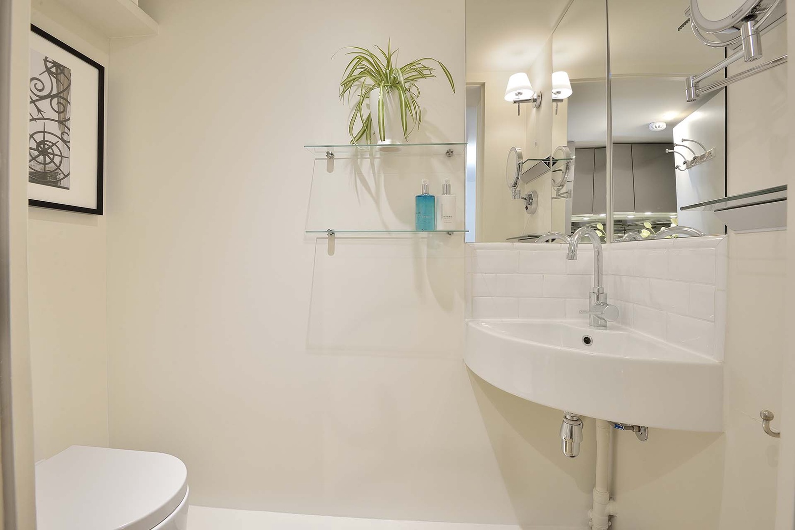 There is a practical separate half bath next to the kitchen.