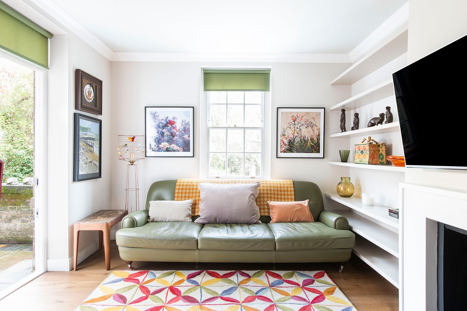 The living room is full of light and opens to private terrace.