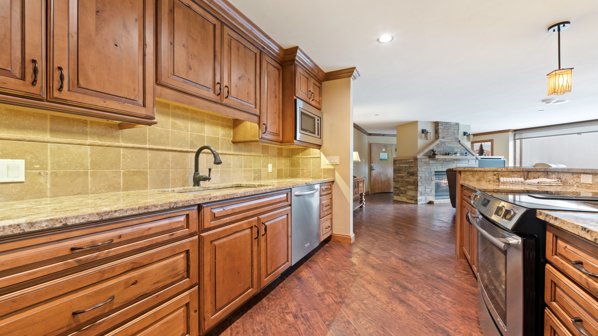 Step into your gourmet kitchen, fully equipped with granite counters, stainless appliances, and ample cabinet space—ready for your favorite recipes and morning coffee rituals.