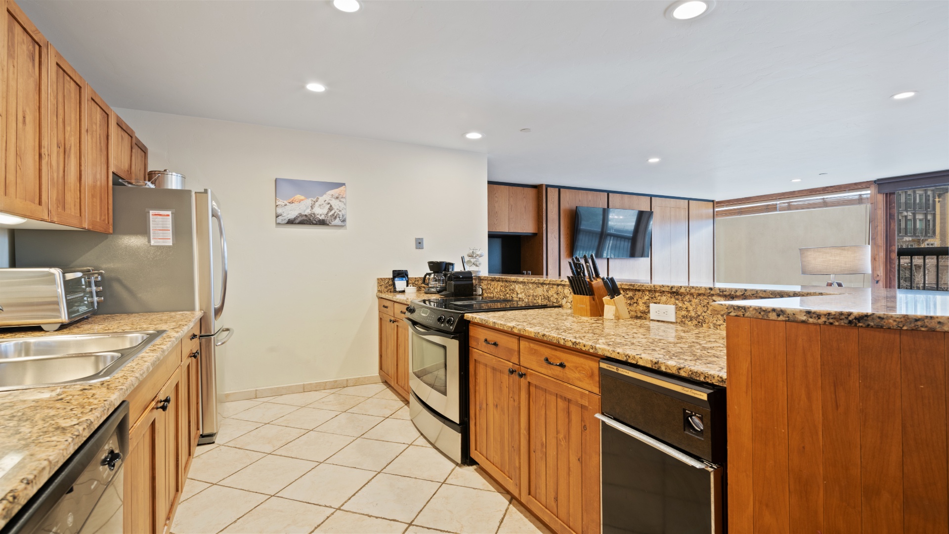 Your fully equipped kitchen awaits with granite countertops, stainless appliances, and everything you need to cook up memorable meals during your stay.