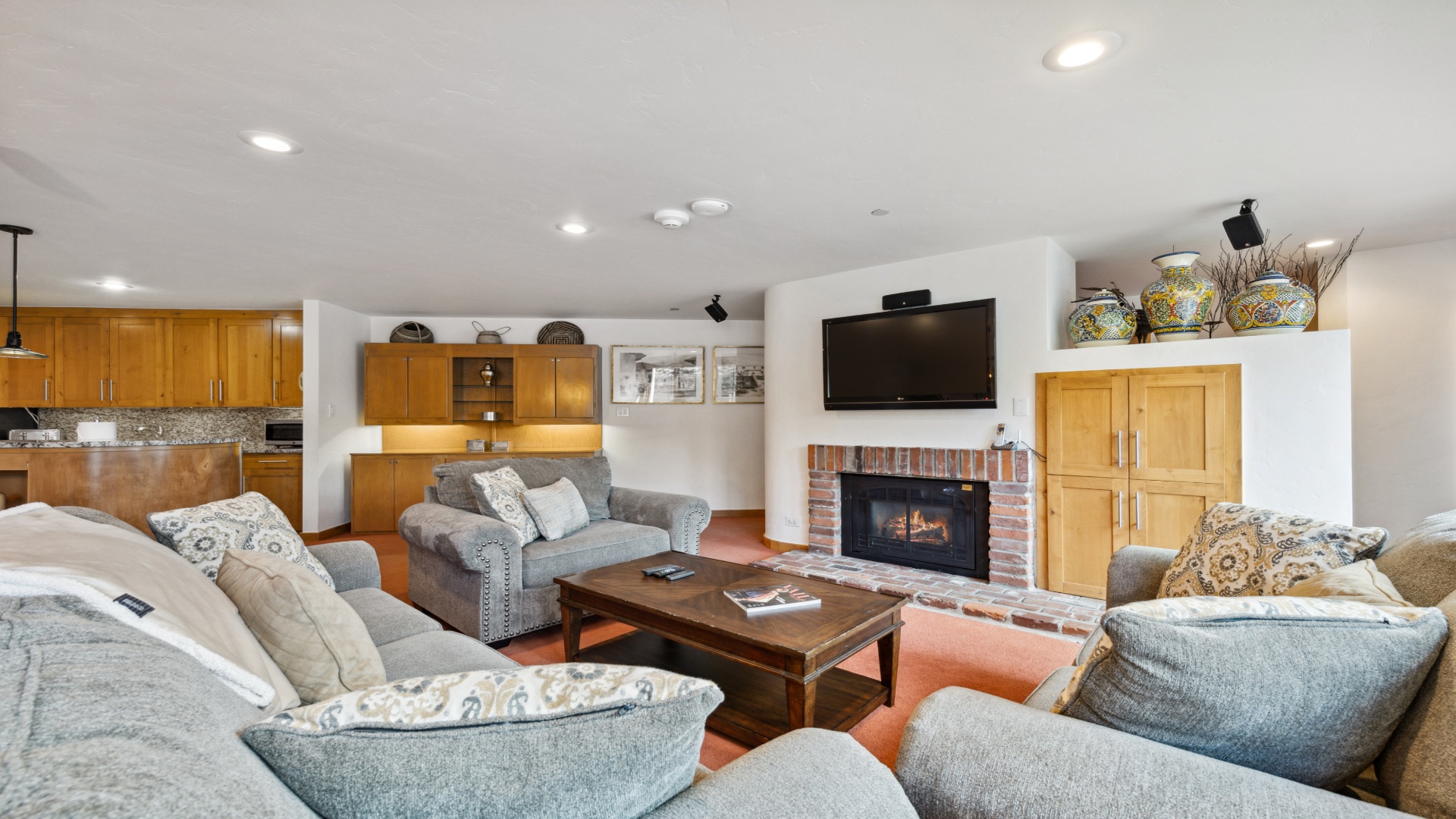 Sink into plush seating by the fireplace and enjoy your favorite shows—this bright, open living space is perfect for relaxing together after a day of adventure.