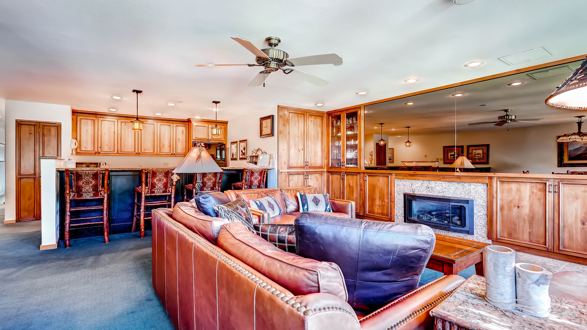Settle into rich leather seating and enjoy your favorite shows with plenty of room to spread out. A gas fireplace adds warmth, while ceiling fans keep you comfortable year-round.