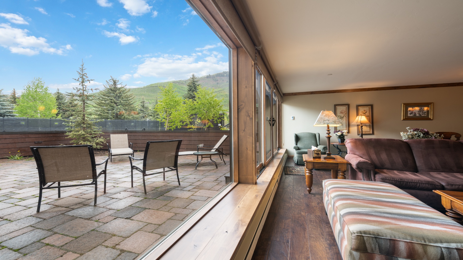 Open the doors to your private patio and let the mountain air refresh your spirit. Enjoy morning coffee or evening gatherings with stunning views framing your relaxing retreat.