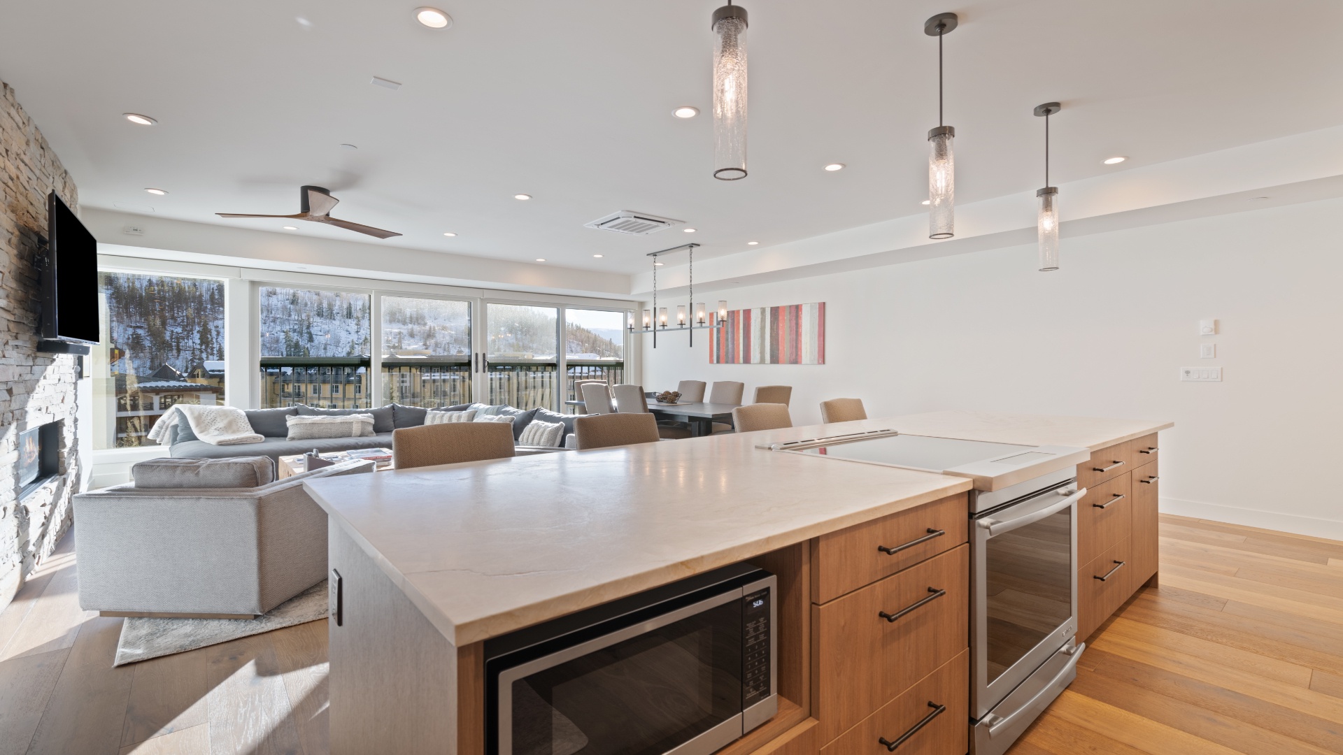 Your open-concept retreat blends modern elegance with mountain charm. Gather around the spacious island, relax by the fireplace, or savor scenic views through panoramic windows.