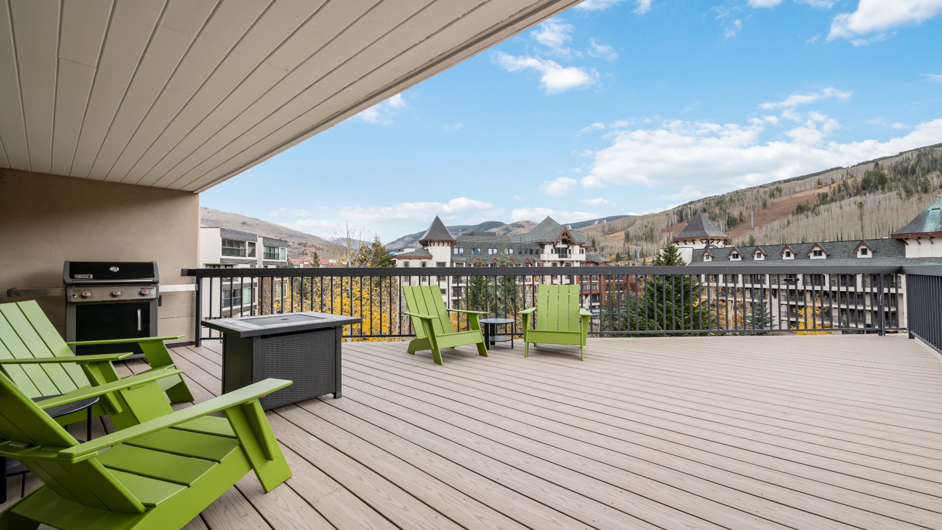 Settle into your private terrace with mountain views, fresh alpine air, and a hot tub where you can unwind after exploring. Fire up the BBQ, sink into bright green chairs, and soak in the peaceful scenery.