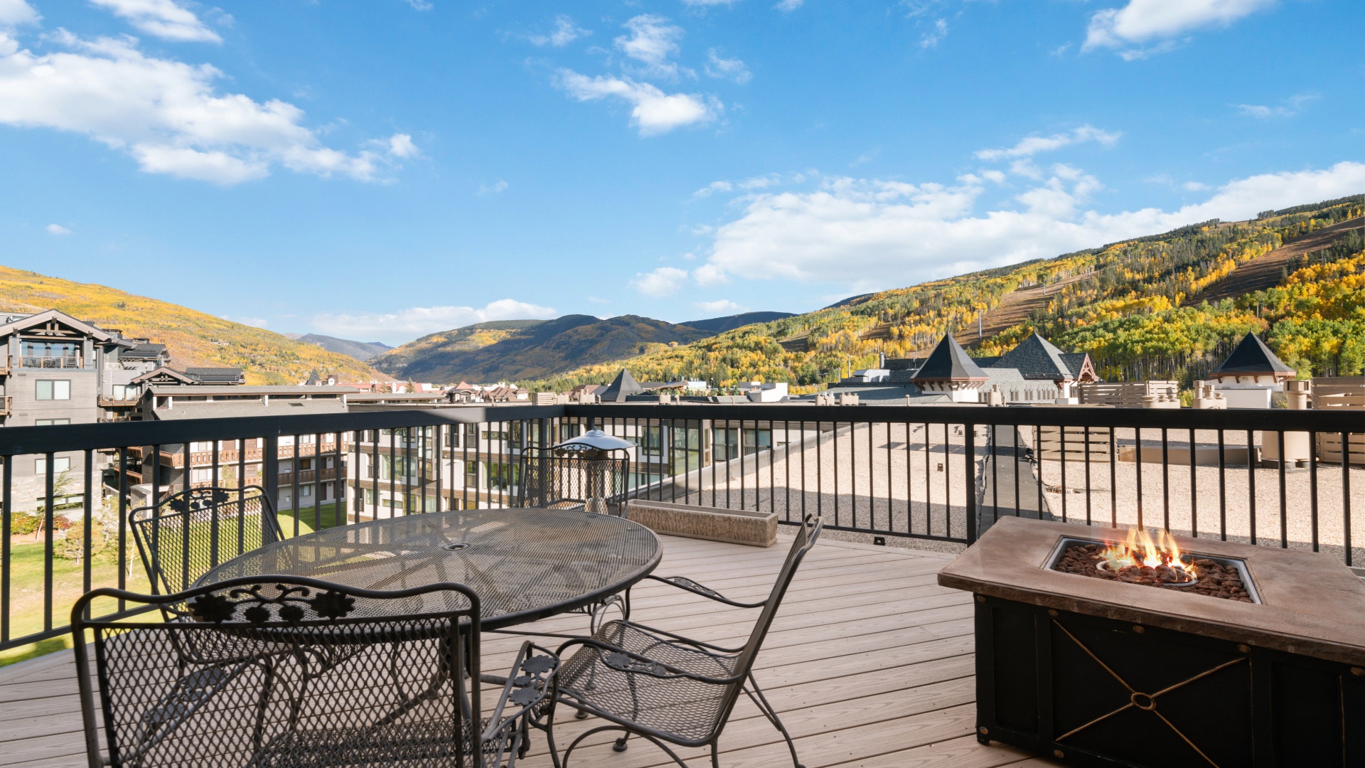 Picture yourself dining al fresco with panoramic mountain views, golden aspens framing the horizon, and a cozy fire pit glowing nearby—your perfect retreat awaits.