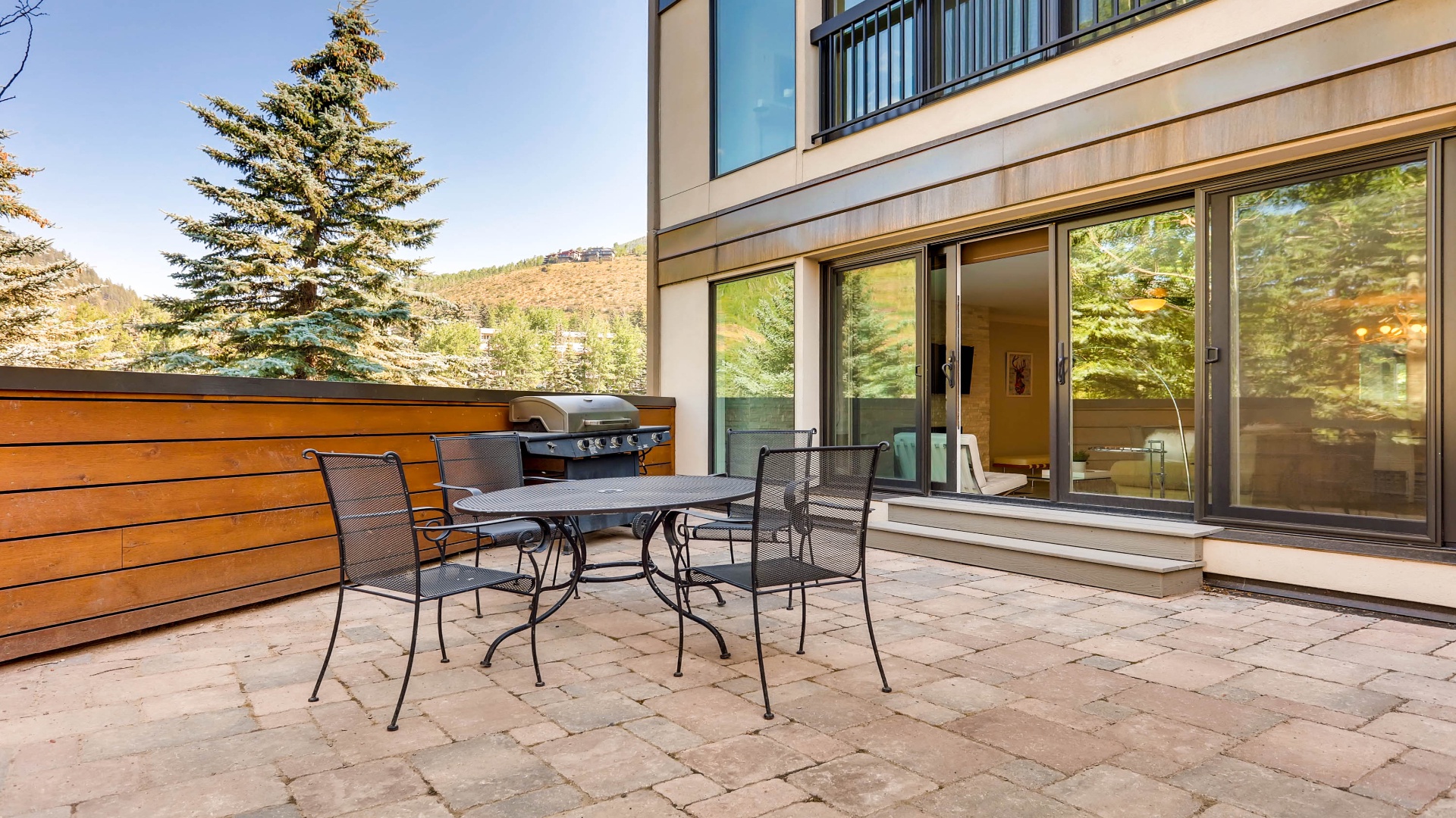 Step onto your private patio with mountain views—perfect for morning coffee or grilling out while you soak in the fresh alpine air and peaceful surroundings.