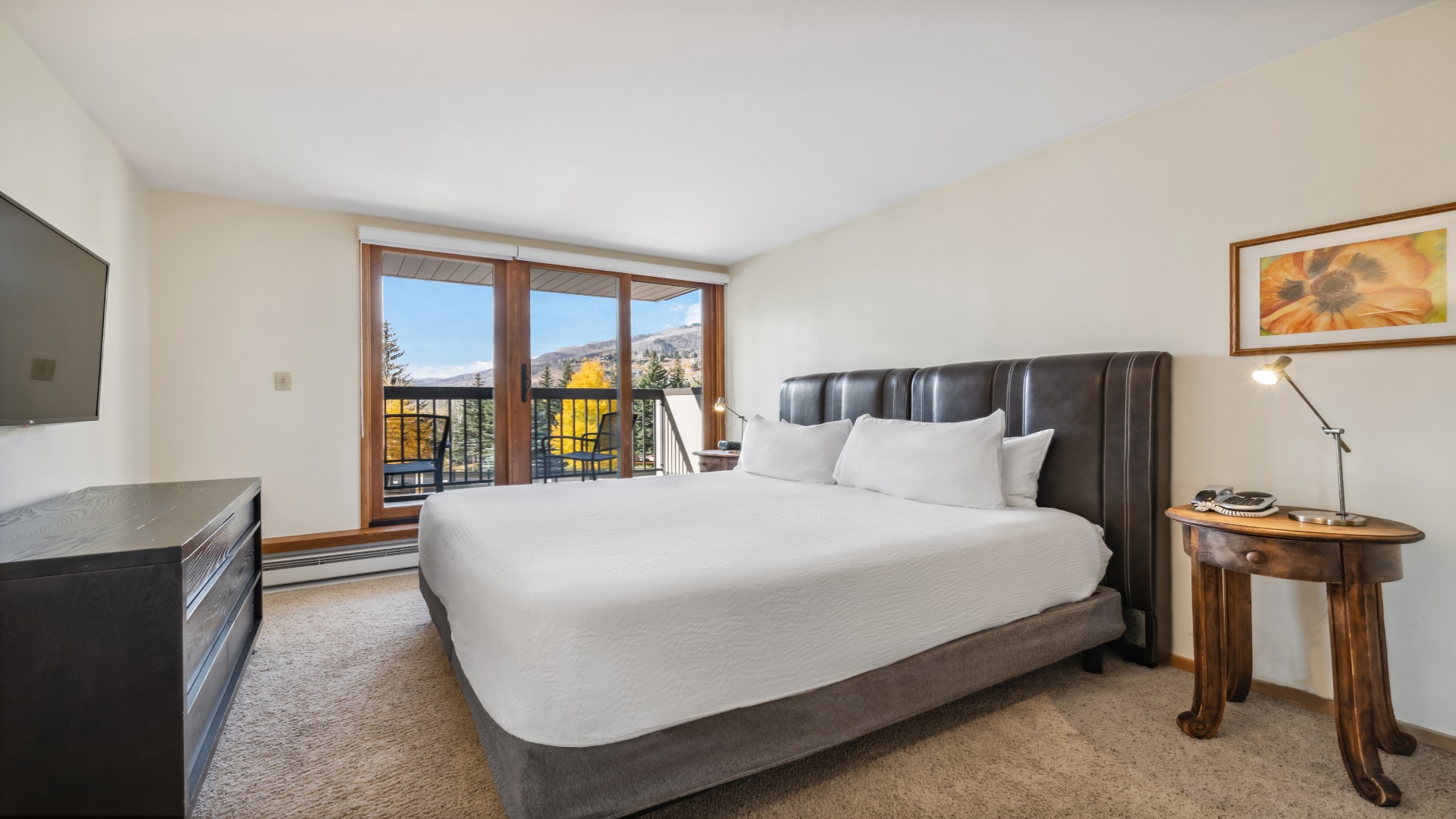 Wake up to stunning mountain views from your comfortable king bed. Crisp linens and a private balcony invite you to start each morning in pure relaxation.