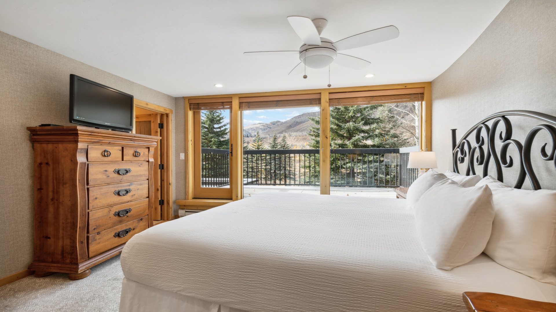 Wake up to breathtaking mountain views from your plush bed. Sliding doors open to your private balcony, where crisp air and scenic beauty greet you each morning.