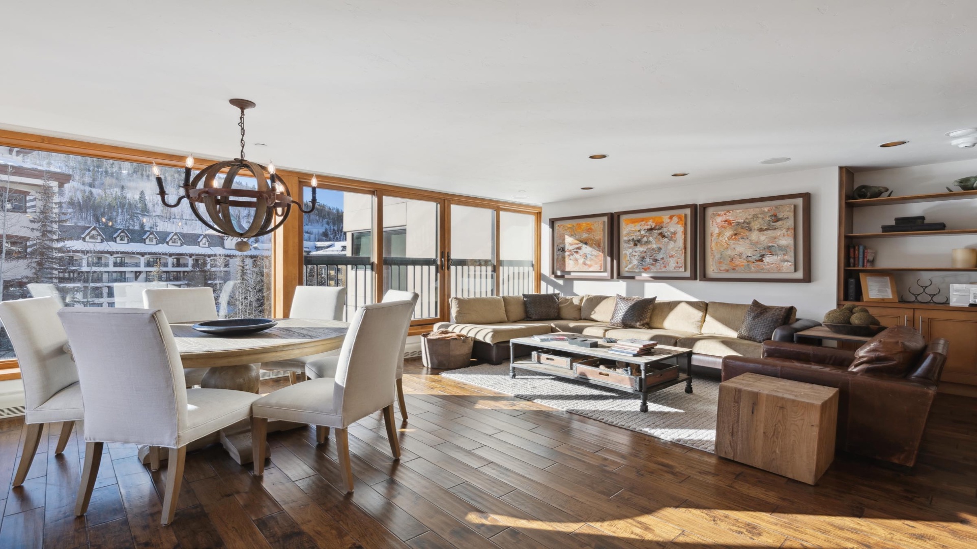 Unwind in your expansive living and dining area, bathed in natural light and framed by stunning ski resort views. The open layout invites you to relax or gather around the table after a day on the slopes.