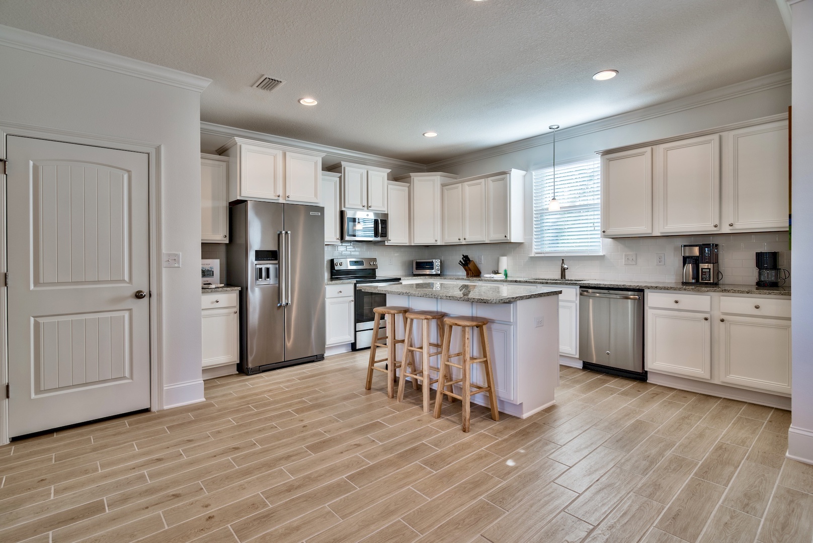 The spacious kitchen is perfect for preparing family meals!
